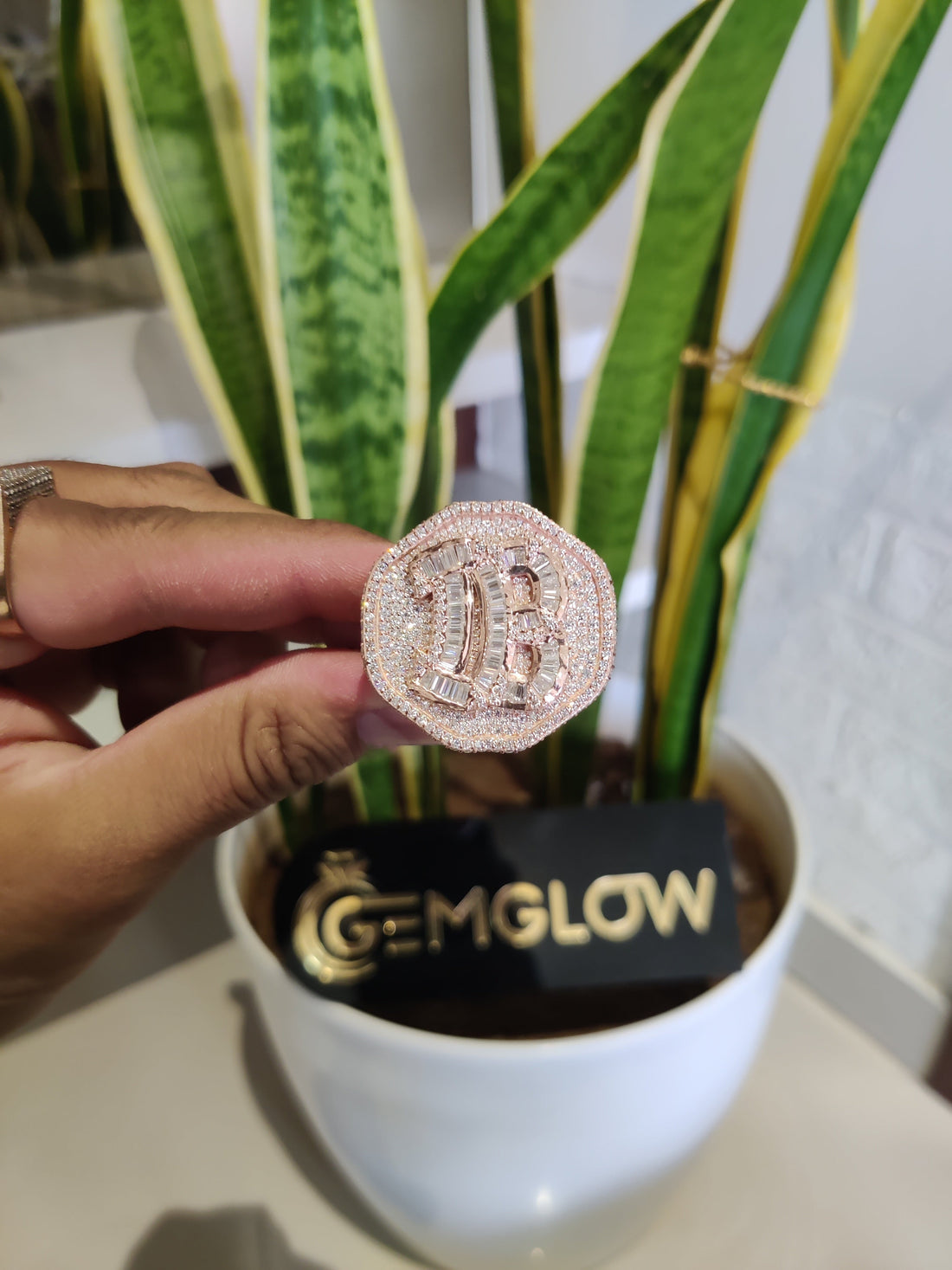 Big Bling Energy: The Story Behind This Custom Iced-Out Initial Ring
