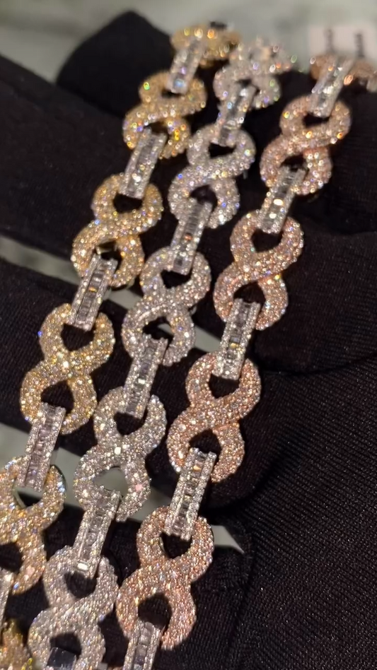 Side angle of silver infinity bracelet, fully iced links with a sleek hip hop-inspired finish