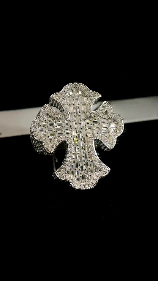 Top-down shot of iced cross design ring with VVS moissanite shine