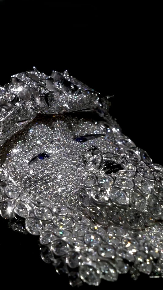 Side view of the silver Jesus pendant with marquise and round stones, emphasizing intricate detailing