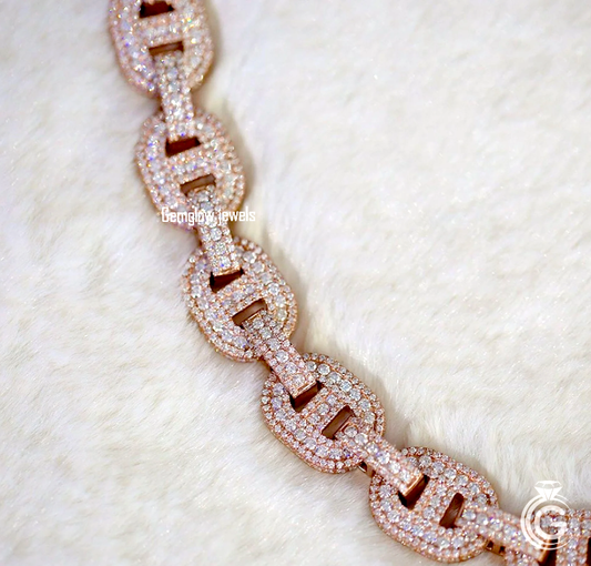 Zoomed-in moissanite diamonds on 14mm Cuban links, VVS clarity, iced luxury chain