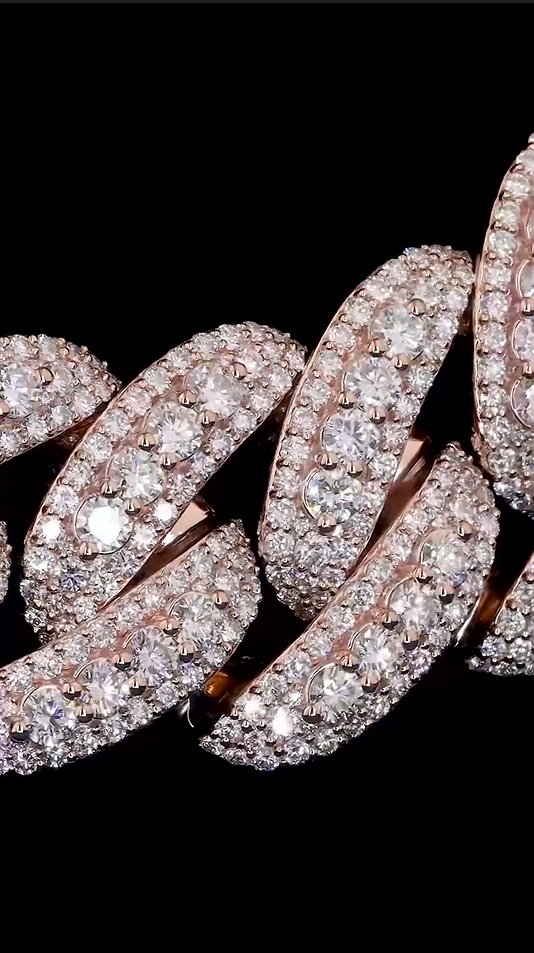 Angled image of rapper-style 22mm Cuban chain, iced links reflecting light.