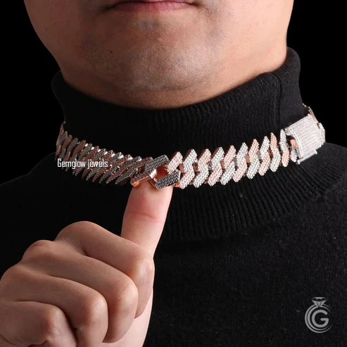 Angled view of 12mm two-tone Cuban chain, unique infinity pattern with iced diamonds