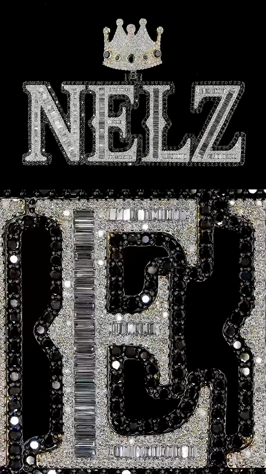 Close-up of the NELZ pendant with brilliant-cut colorless and black diamonds, emphasizing its bold design