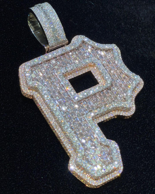 Close-up of the P letter pendant, showcasing sparkling round and baguette-cut diamonds