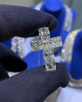 Angled view of the Ascher cut Moissanite cross pendant, emphasizing its 20mm width and 30mm height