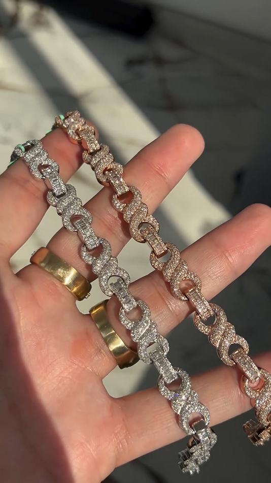 Full view of iced out 10mm bracelet, round and baguette cut stones in thick luxury design