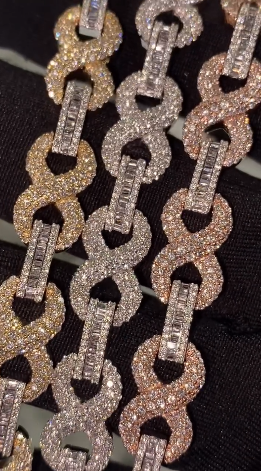 Iced out infinity bracelet in 925 silver, shimmering round cut stones in continuous loop design