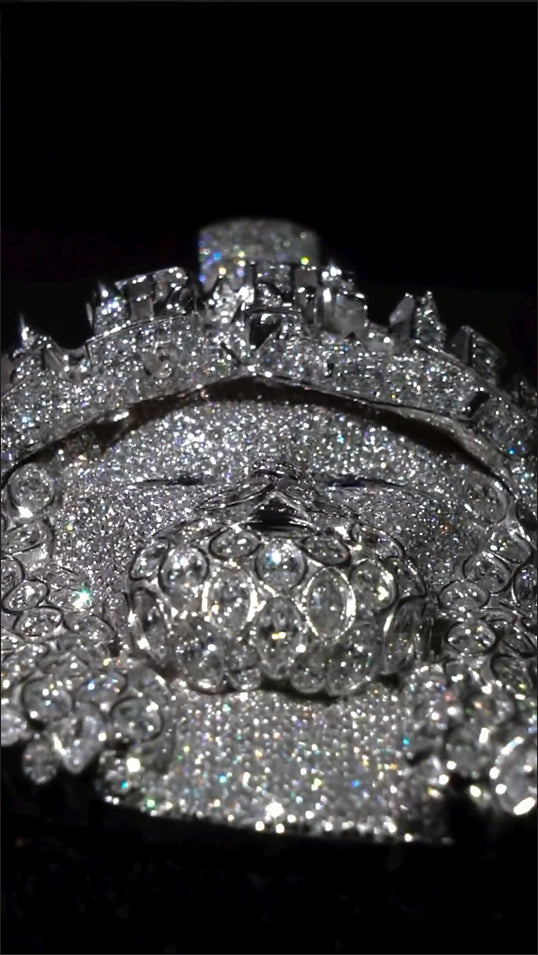 Angled view of the Jesus pendant with Moissanite and Cubic Zirconia stones, capturing its shine