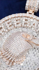 Close-up of iced eagle pendant, detailed feathers and diamond letters