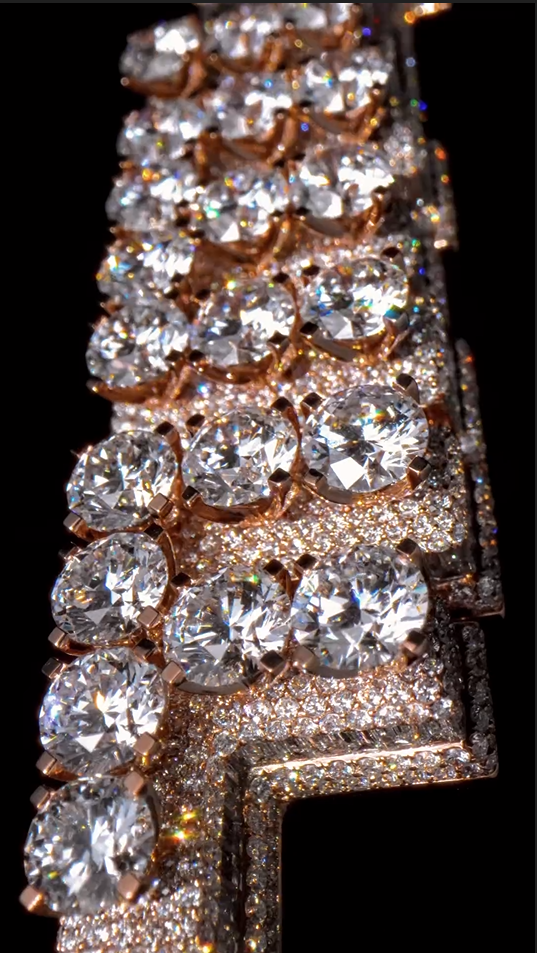 Zoomed-in view of the round diamond on the JEFE letter pendant