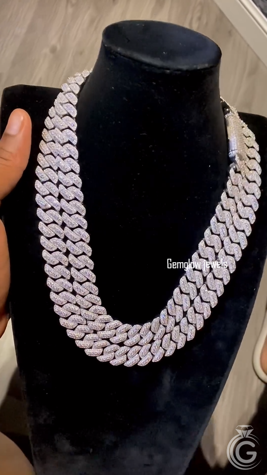 Unisex model wearing 15mm Cuban chain, iced out shine with street-style vibe