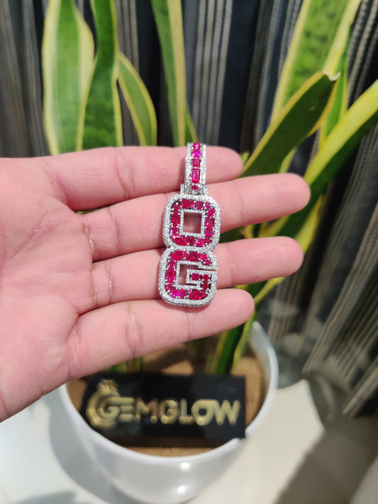 Fully iced 'OG' letter pendant paired with a baguette Moissanite chain