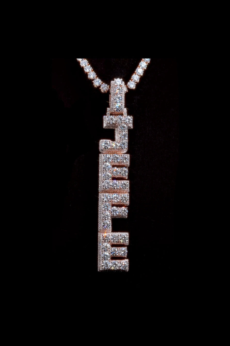 Full iced-out JEFE letter pendant with round and baguette-cut diamonds