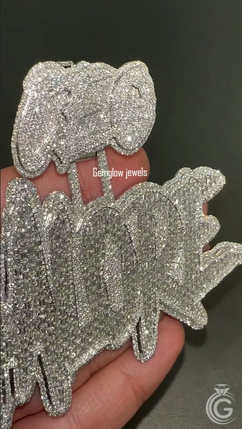 Close-up of iced-out silver name pendant, handcrafted in 925 silver with sparkling diamond accents