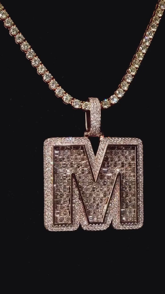 Video of M letter pendant with Moissanite diamonds and 18-inch chain, showcasing bold hip-hop style